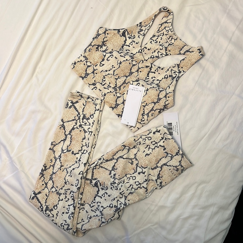 NWT ALLFENIX x Anthropologie bundle. White Python sports bra and leggings